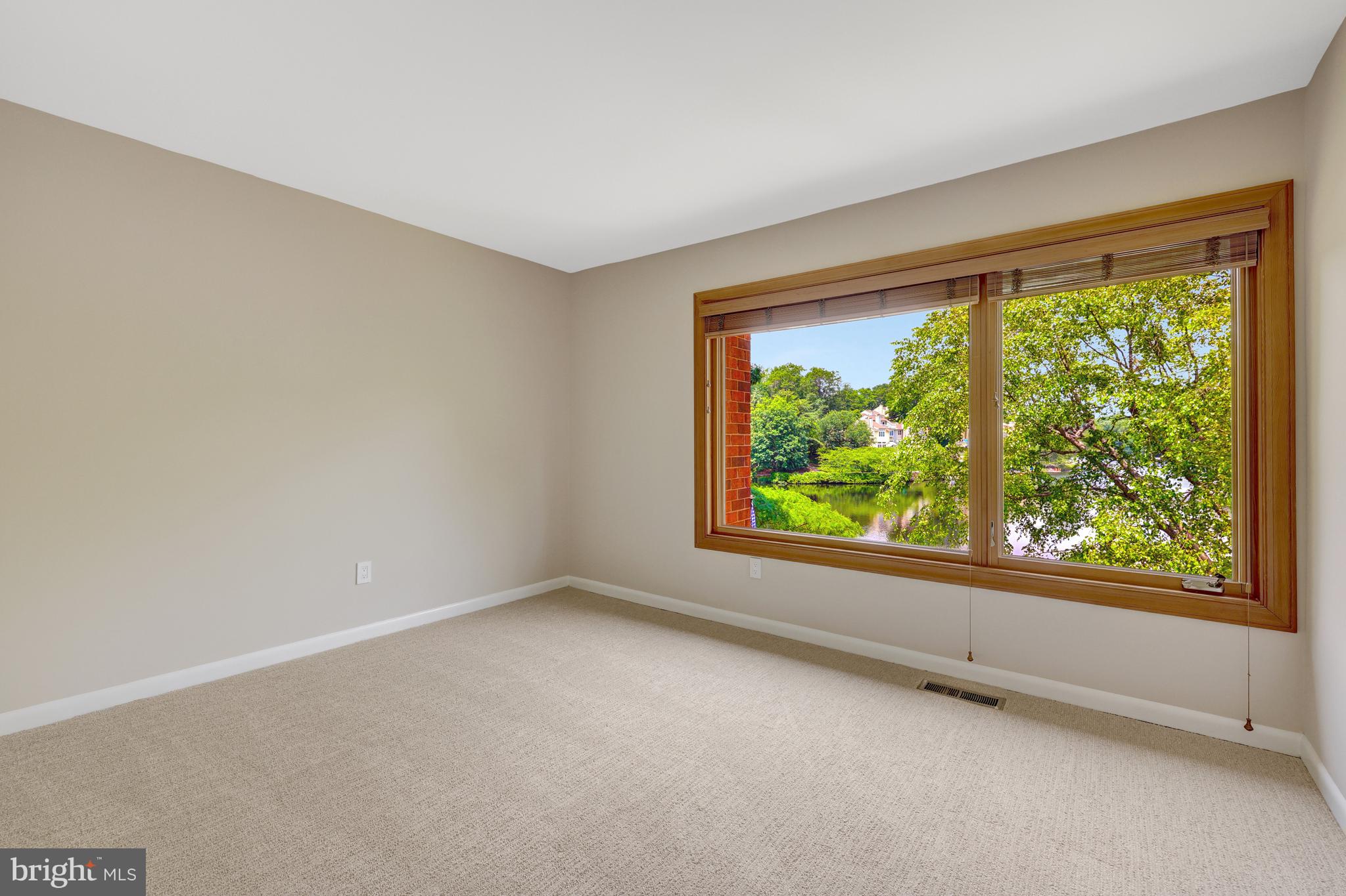 11064 Thrush Ridge Road Reston, VA 20191 - Photo 49 of 85 a view of a big room with window