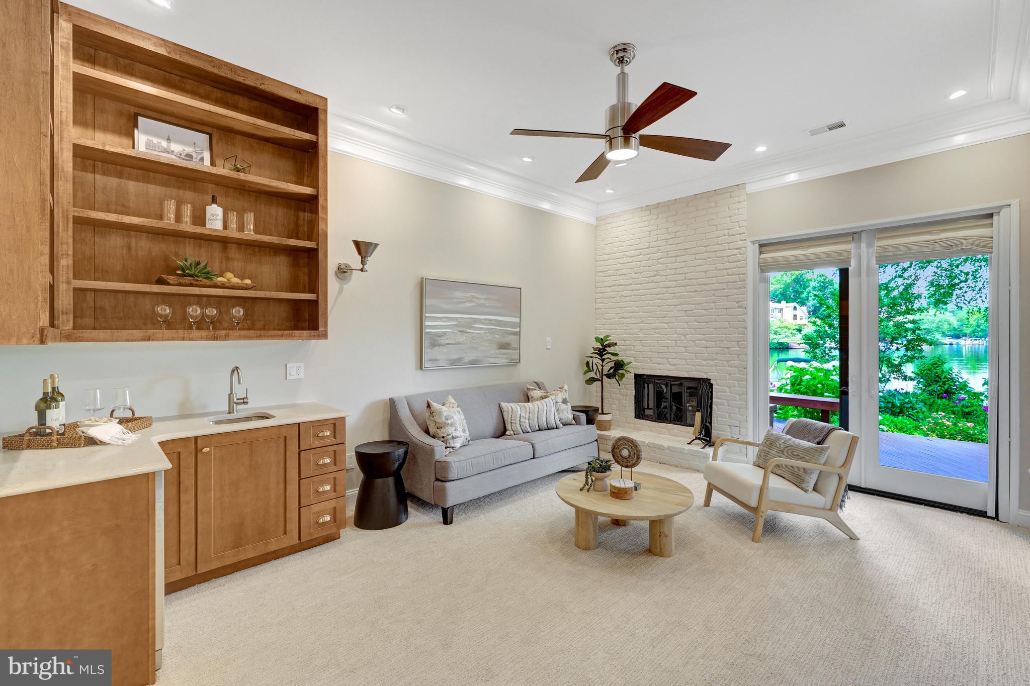 11064 Thrush Ridge Road Reston, VA 20191 - Photo 53 of 85 a living room with furniture ceiling fan and a window