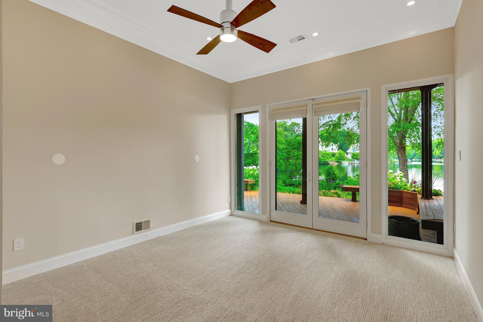 11064 Thrush Ridge Road Reston, VA 20191 - Photo 61 of 85 Bedroom #4 on the lower level has glass doors.