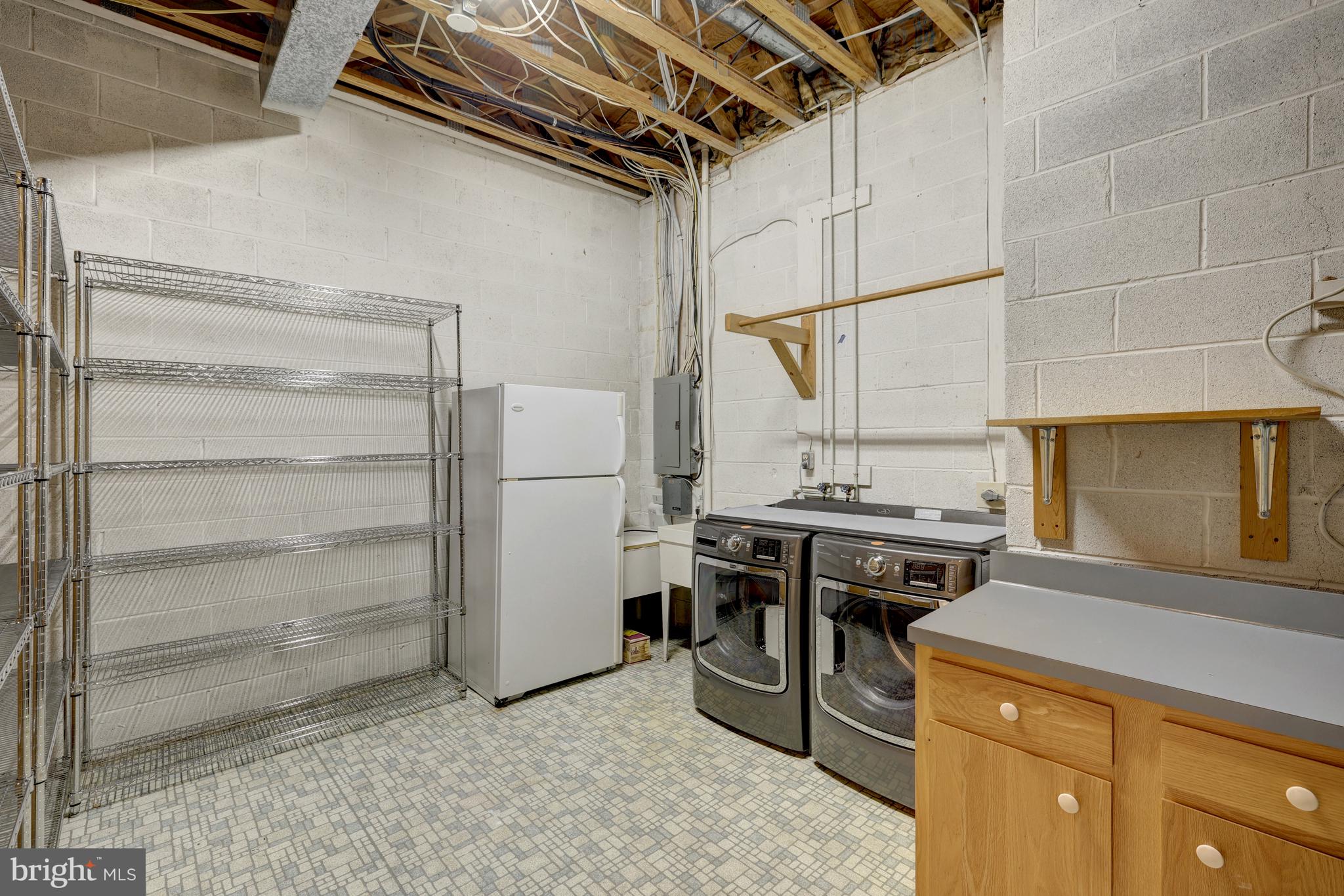 11064 Thrush Ridge Road Reston, VA 20191 - Photo 68 of 85 The laundry and storage room has great space.
