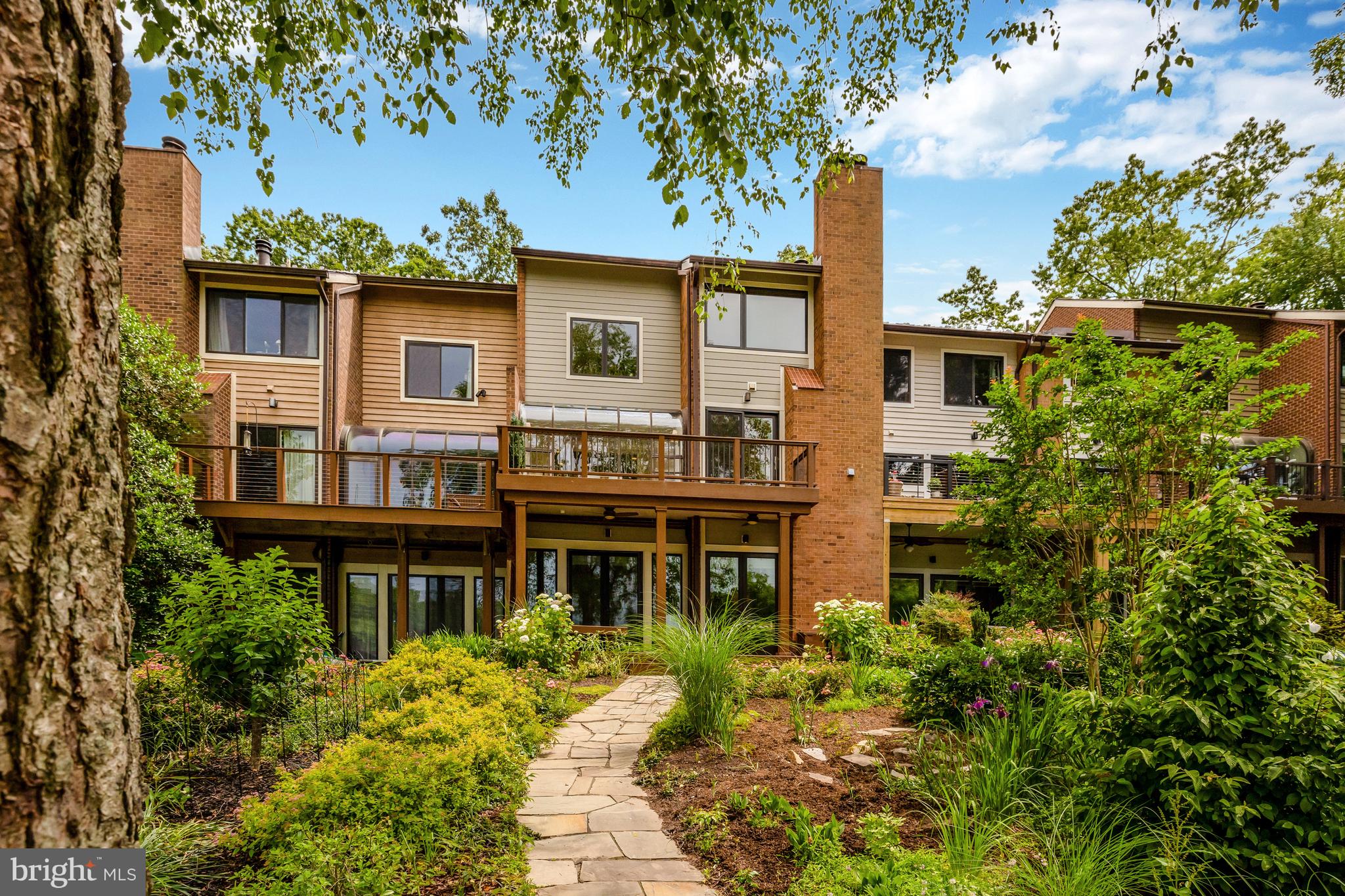 11064 Thrush Ridge Road Reston, VA 20191 - Photo 69 of 85 A view of the house from the lake.