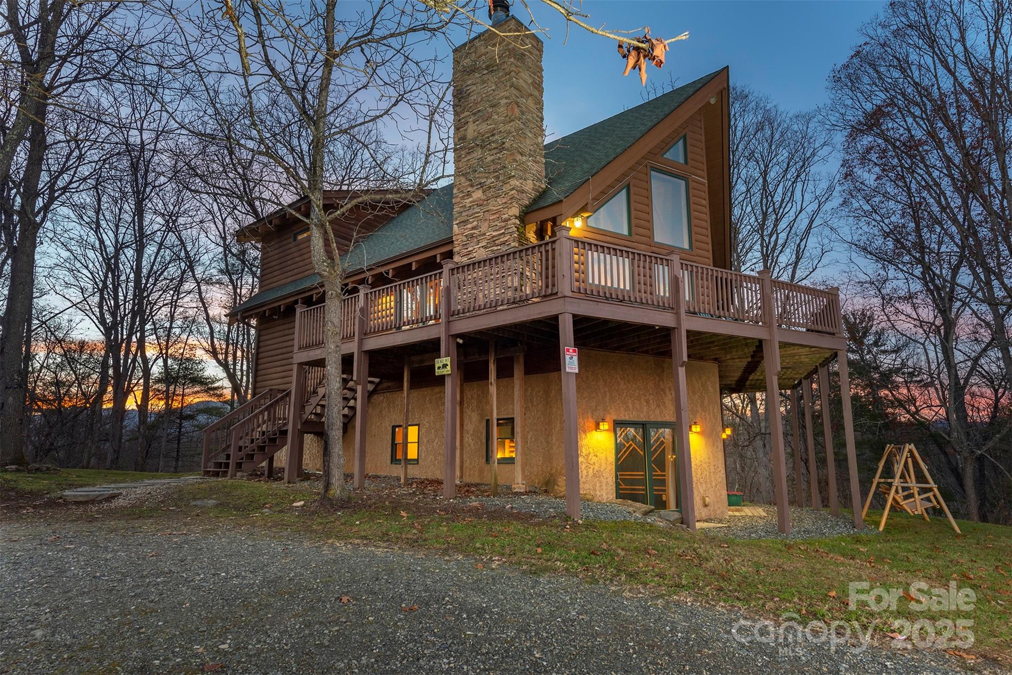395 Dry Pond Road Marshall, NC 28753 - Photo 2 of 47 a front view of a house with a yard