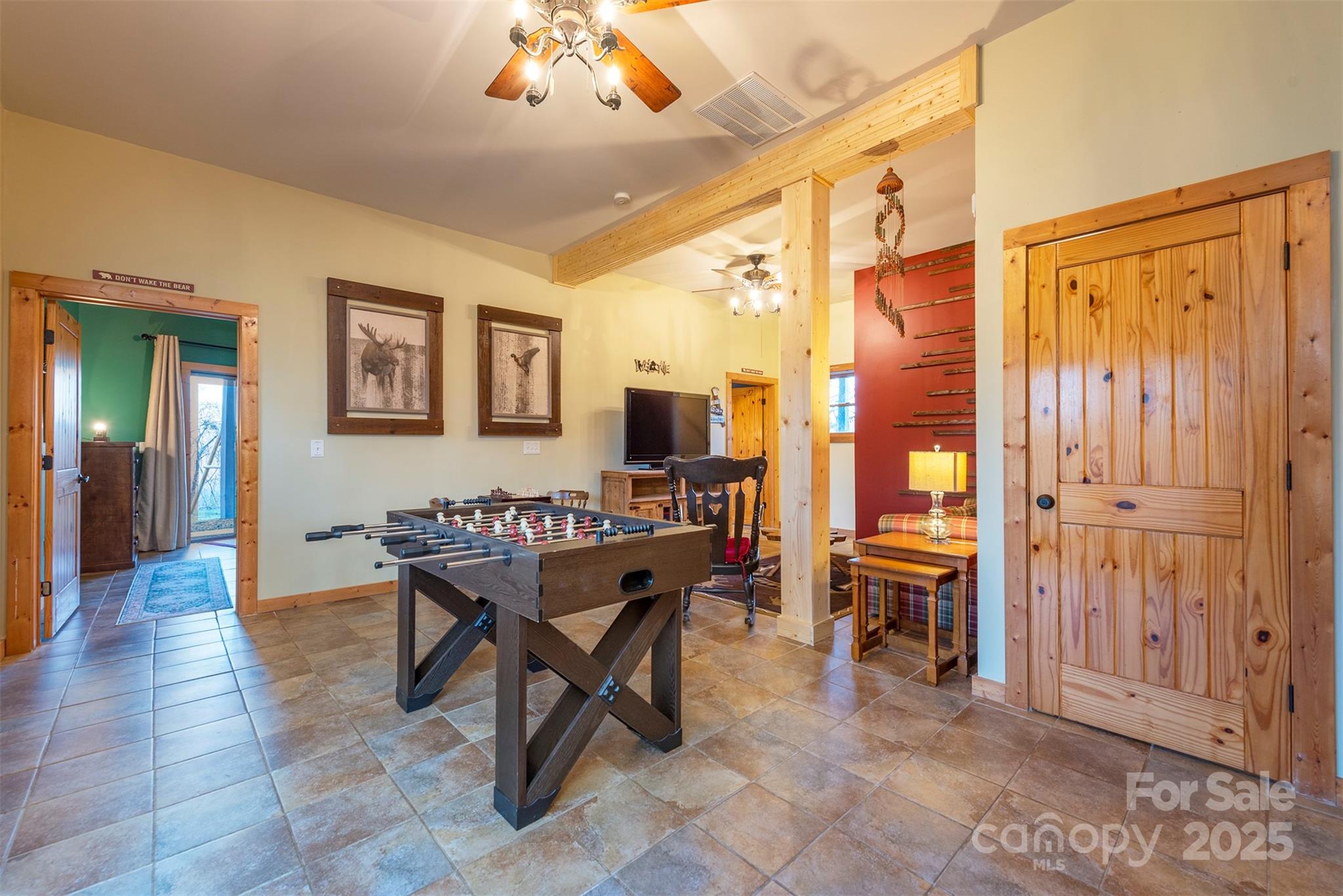 395 Dry Pond Road Marshall, NC 28753 - Photo 29 of 47 a view of a livingroom with furniture window and wooden floor
