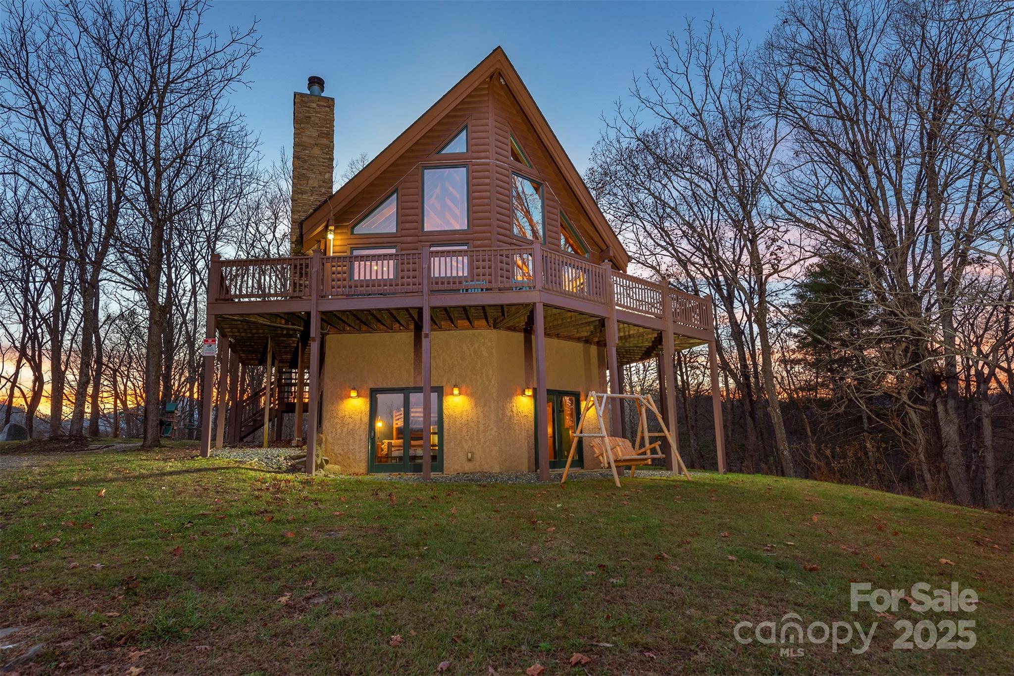395 Dry Pond Road Marshall, NC 28753 - Photo 3 of 47 a front view of a house with a yard
