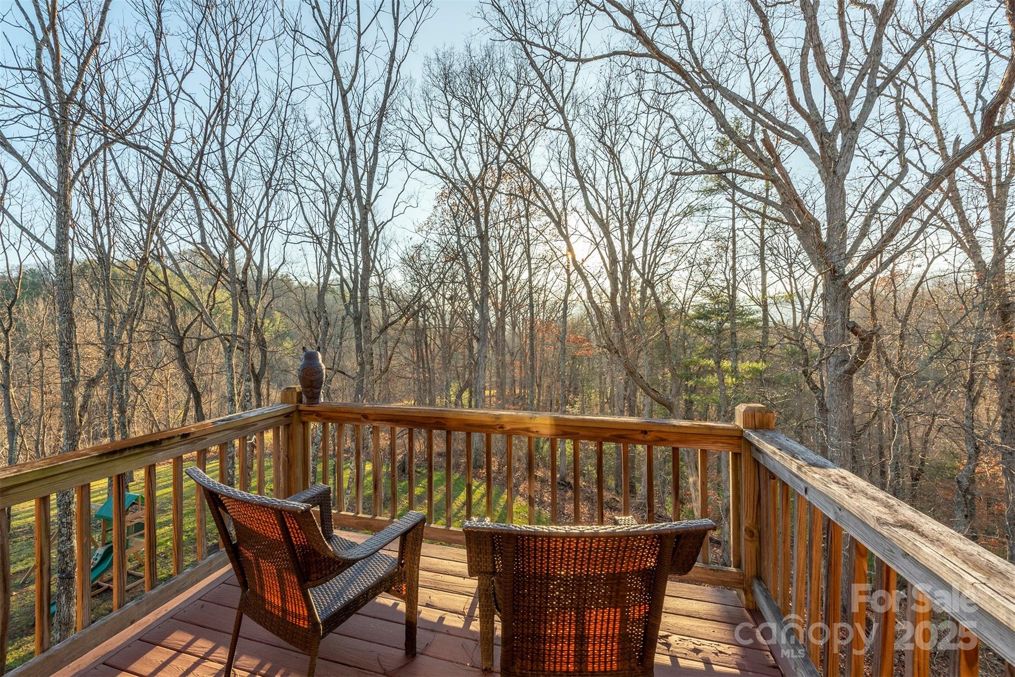 395 Dry Pond Road Marshall, NC 28753 - Photo 8 of 47 a view of a wooden deck with outdoor seating