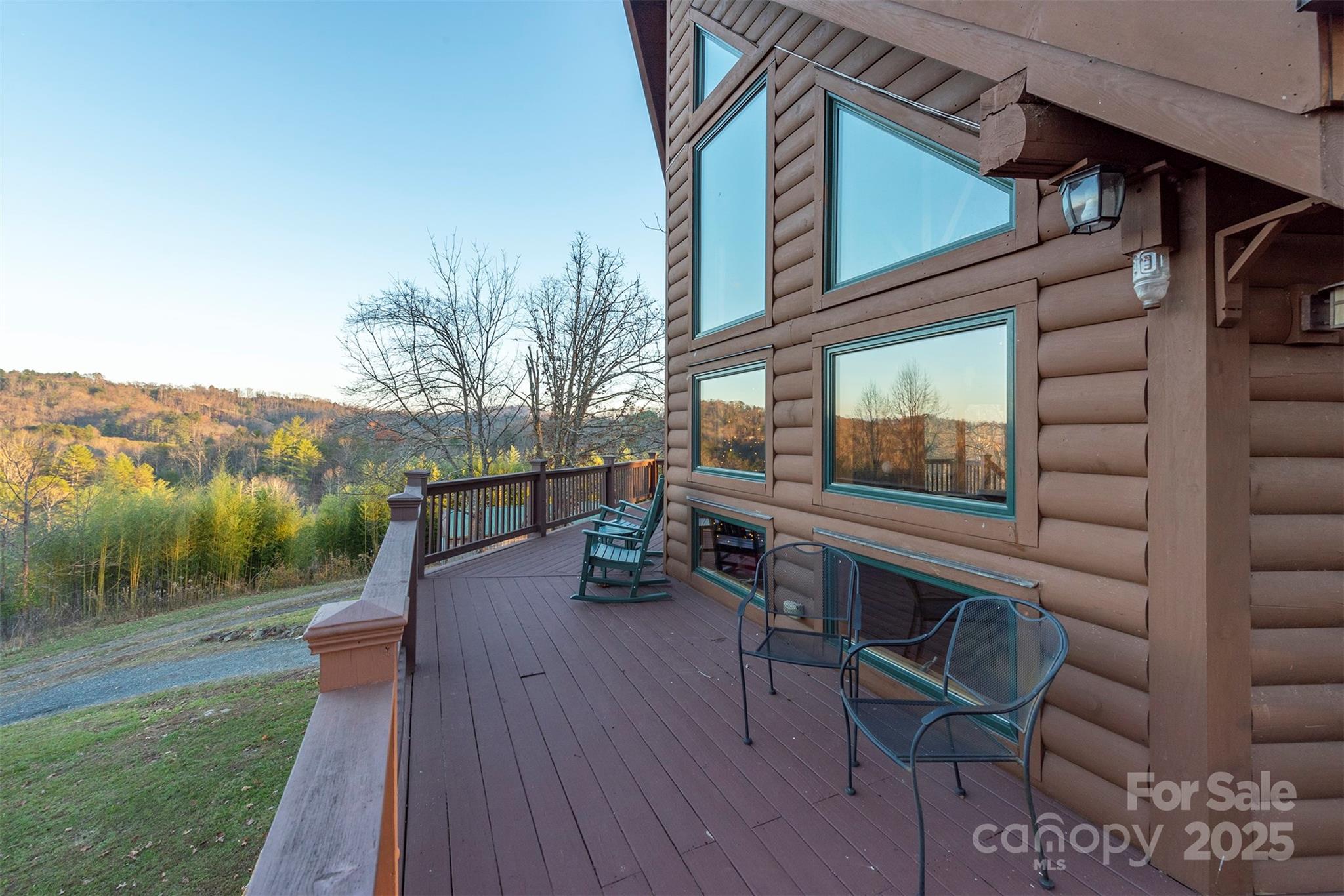 395 Dry Pond Road Marshall, NC 28753 - Photo 9 of 47 a view of balcony with two chairs and a table