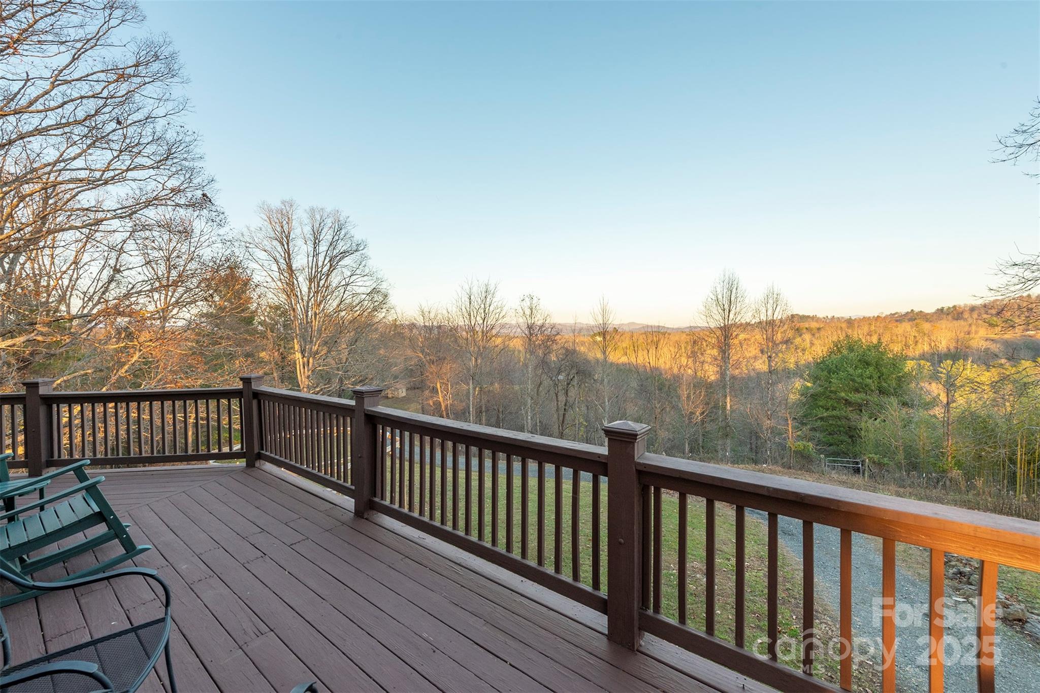 395 Dry Pond Road Marshall, NC 28753 - Photo 10 of 47 a balcony with wooden floor and fence