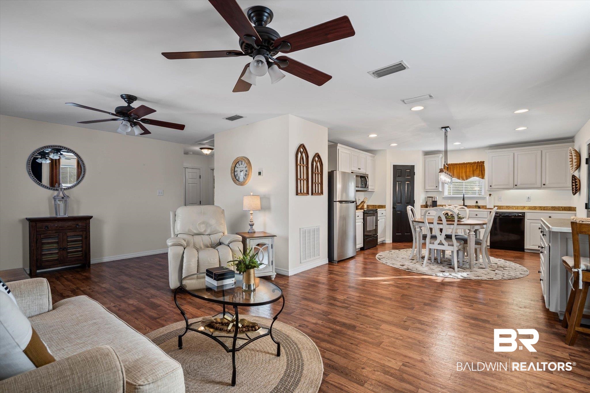 4567 Pine Avenue Saraland, AL 36571 - Photo 28 of 48 Living area featuring dark wood-style flooring, recessed lighting, and a ceiling fan