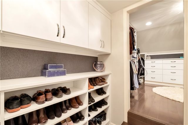 a kitchen with appliances cabinets and a counter top space