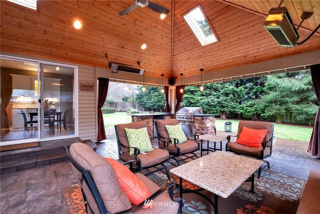 a outdoor space with patio the couches and a potted plant