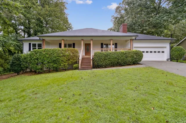 front view of a house with a yard