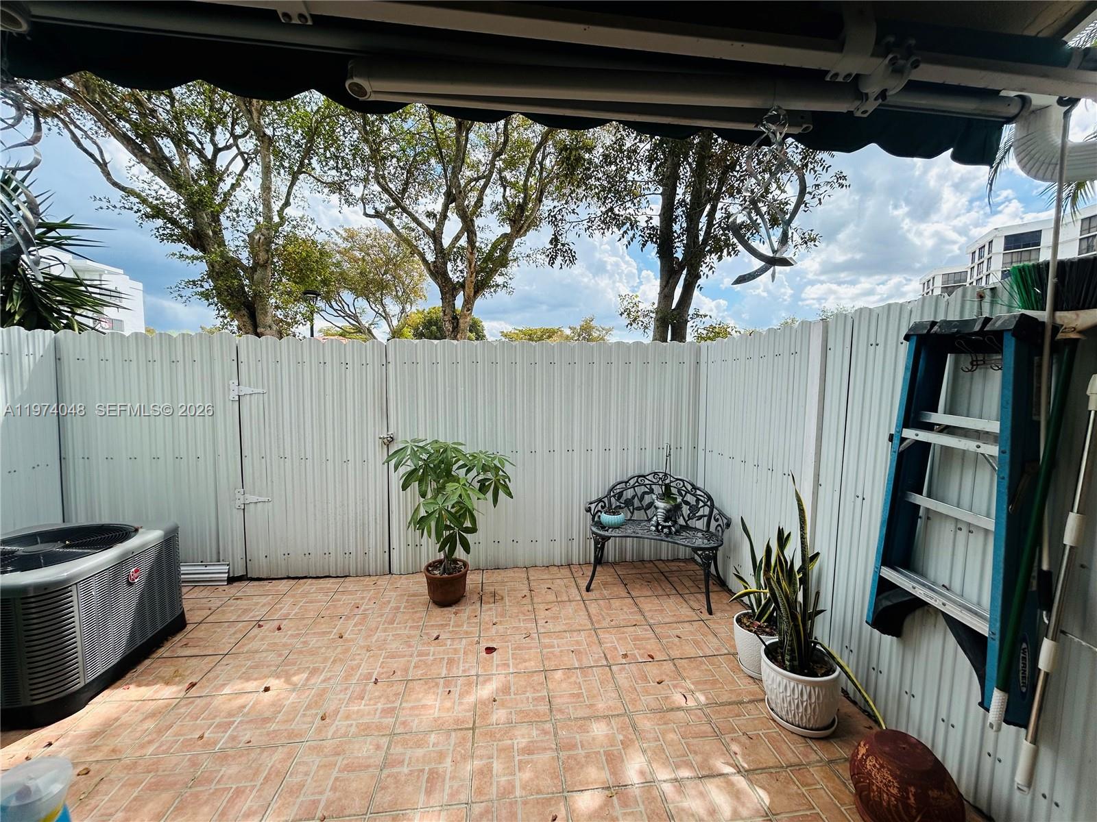 13890 Southwest 64th Street Miami, FL 33183 - Photo 14 of 23 a view of balcony with furniture