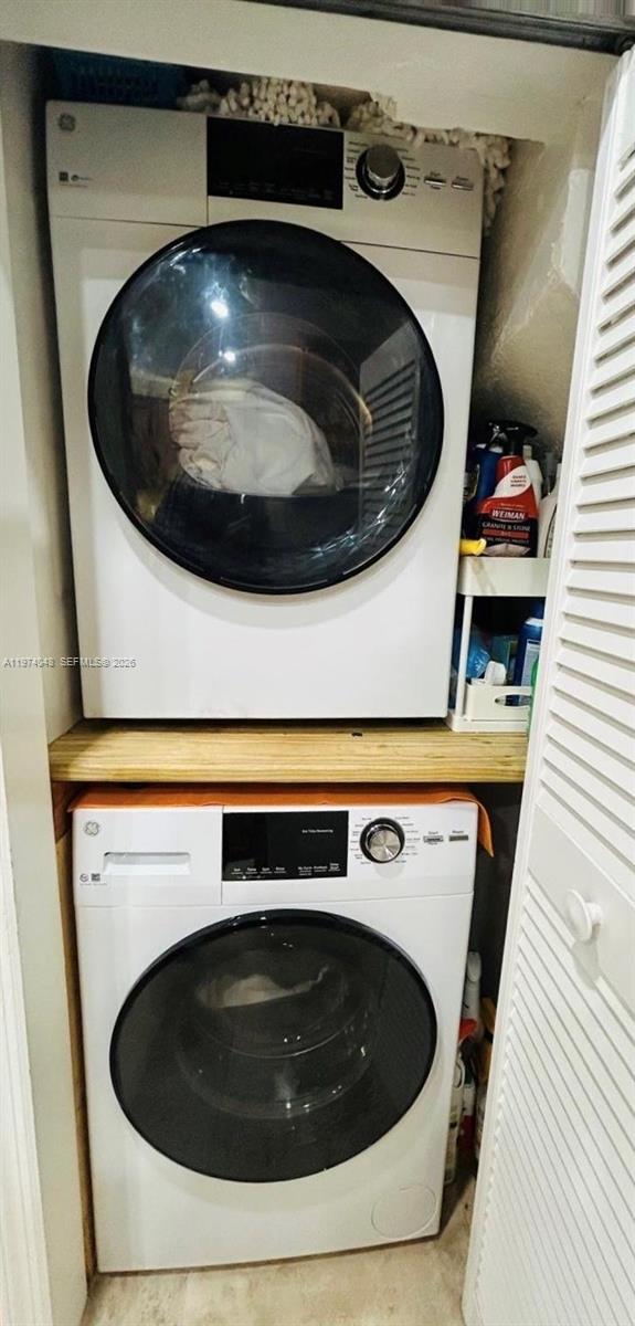 13890 Southwest 64th Street Miami, FL 33183 - Photo 19 of 23 a utility room with washer and dryer