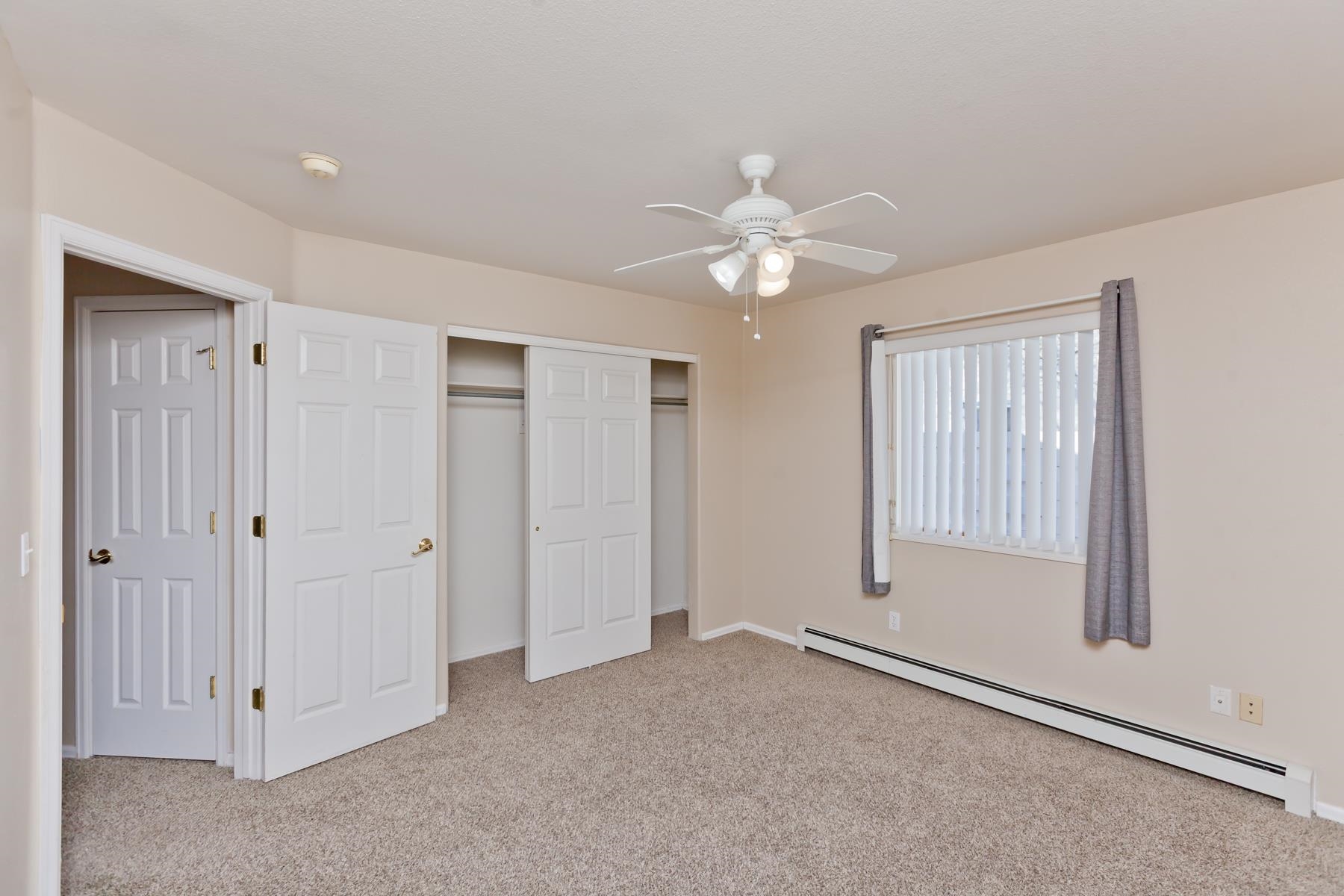 340 Elderberry Drive Fruita, CO 81521 - Photo 20 of 42 a view of an empty room with a window
