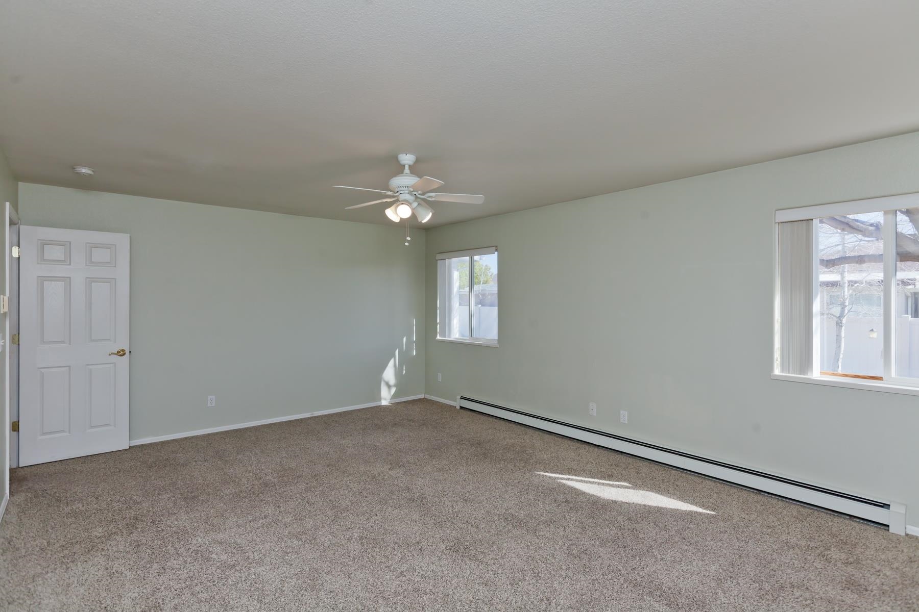 340 Elderberry Drive Fruita, CO 81521 - Photo 28 of 42 an empty room with windows