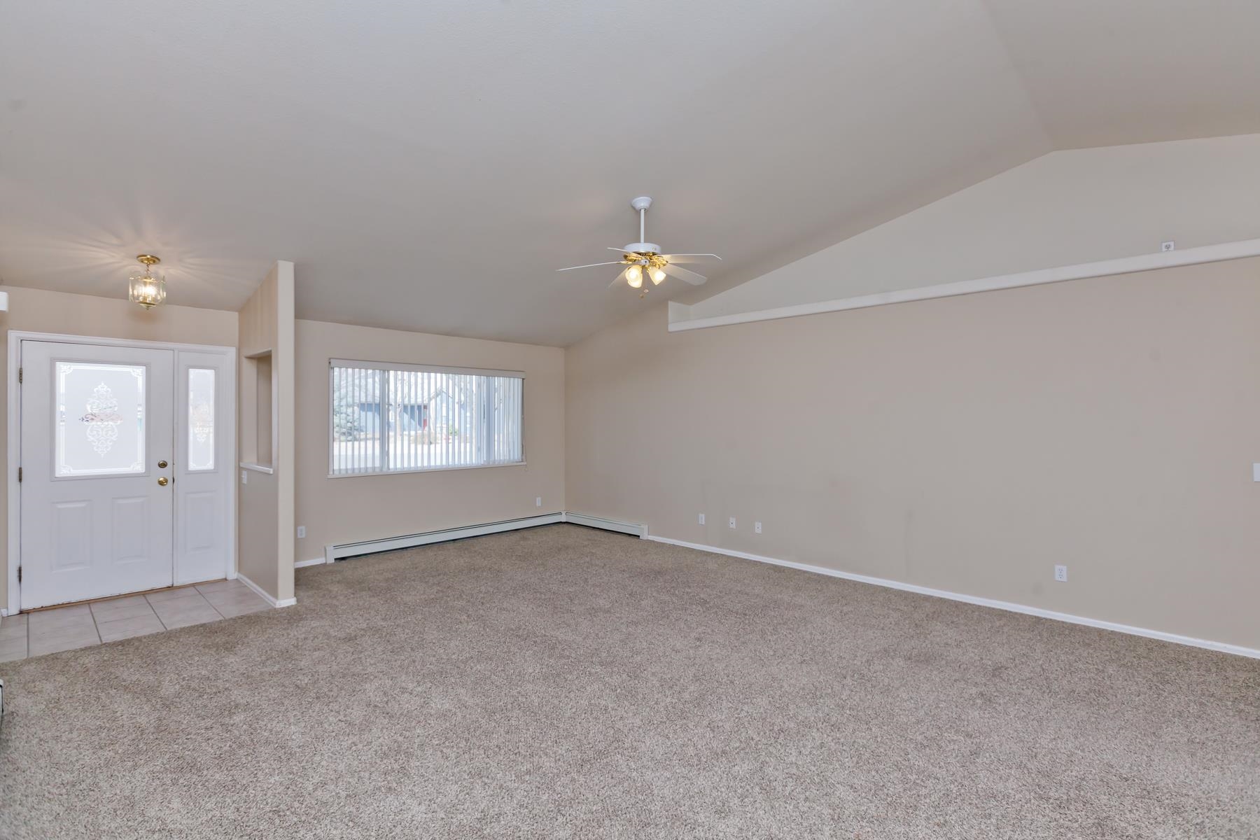 340 Elderberry Drive Fruita, CO 81521 - Photo 3 of 42 a view of an empty room with a window