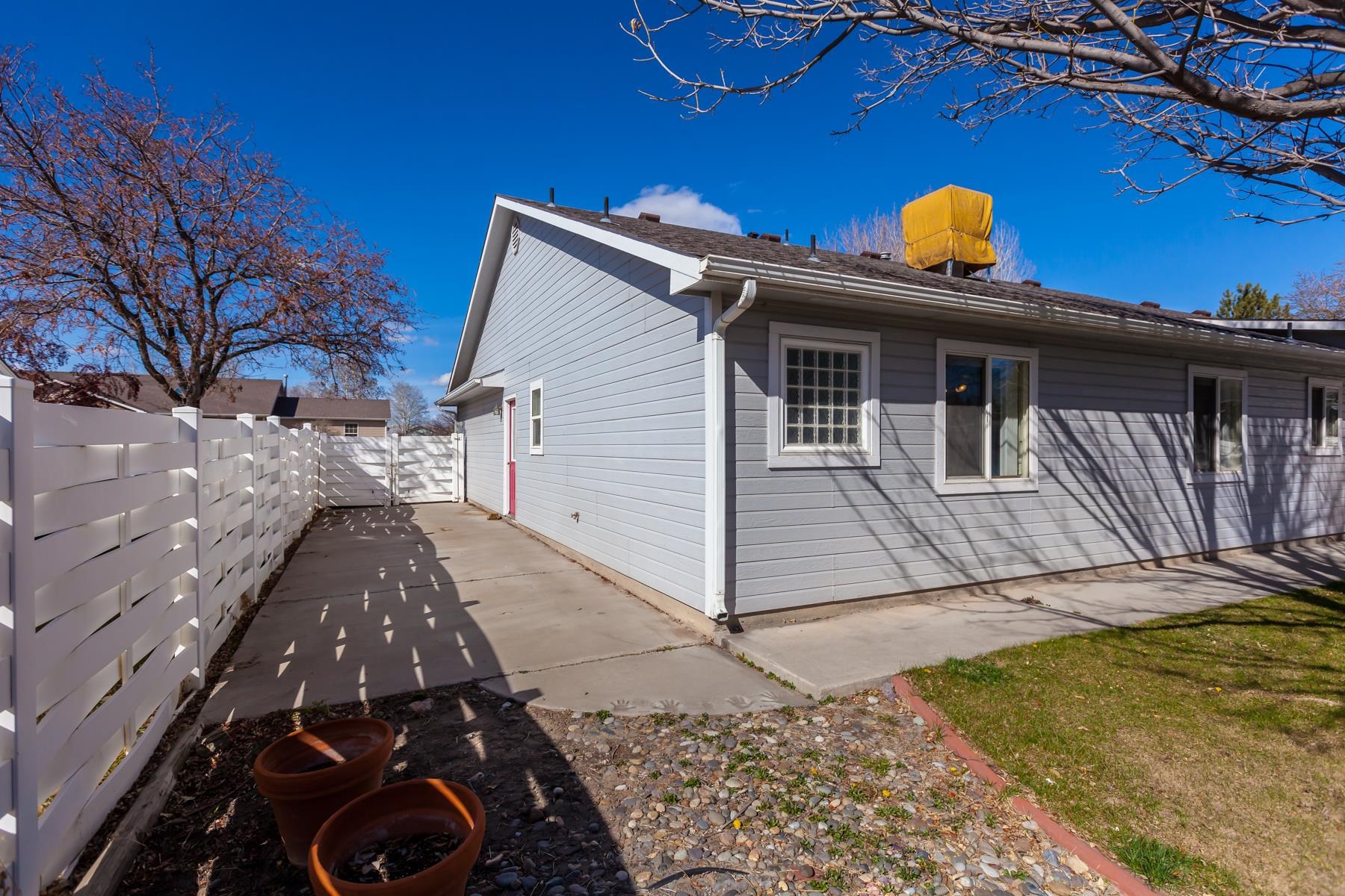 340 Elderberry Drive Fruita, CO 81521 - Photo 33 of 42 a view of a house with a patio