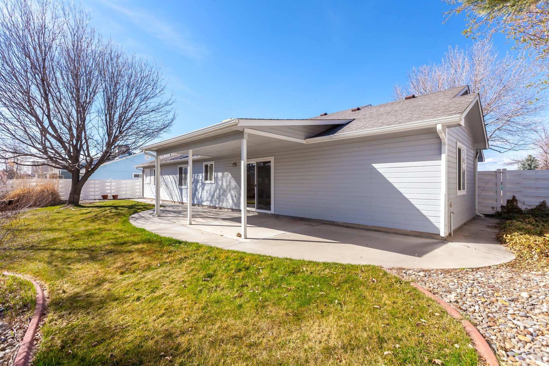 340 Elderberry Drive Fruita, CO 81521 - Photo 39 of 42 a house with swimming pool in front of it