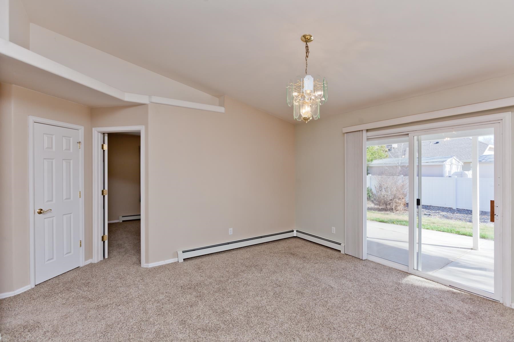 340 Elderberry Drive Fruita, CO 81521 - Photo 5 of 42 a view of an empty room with window