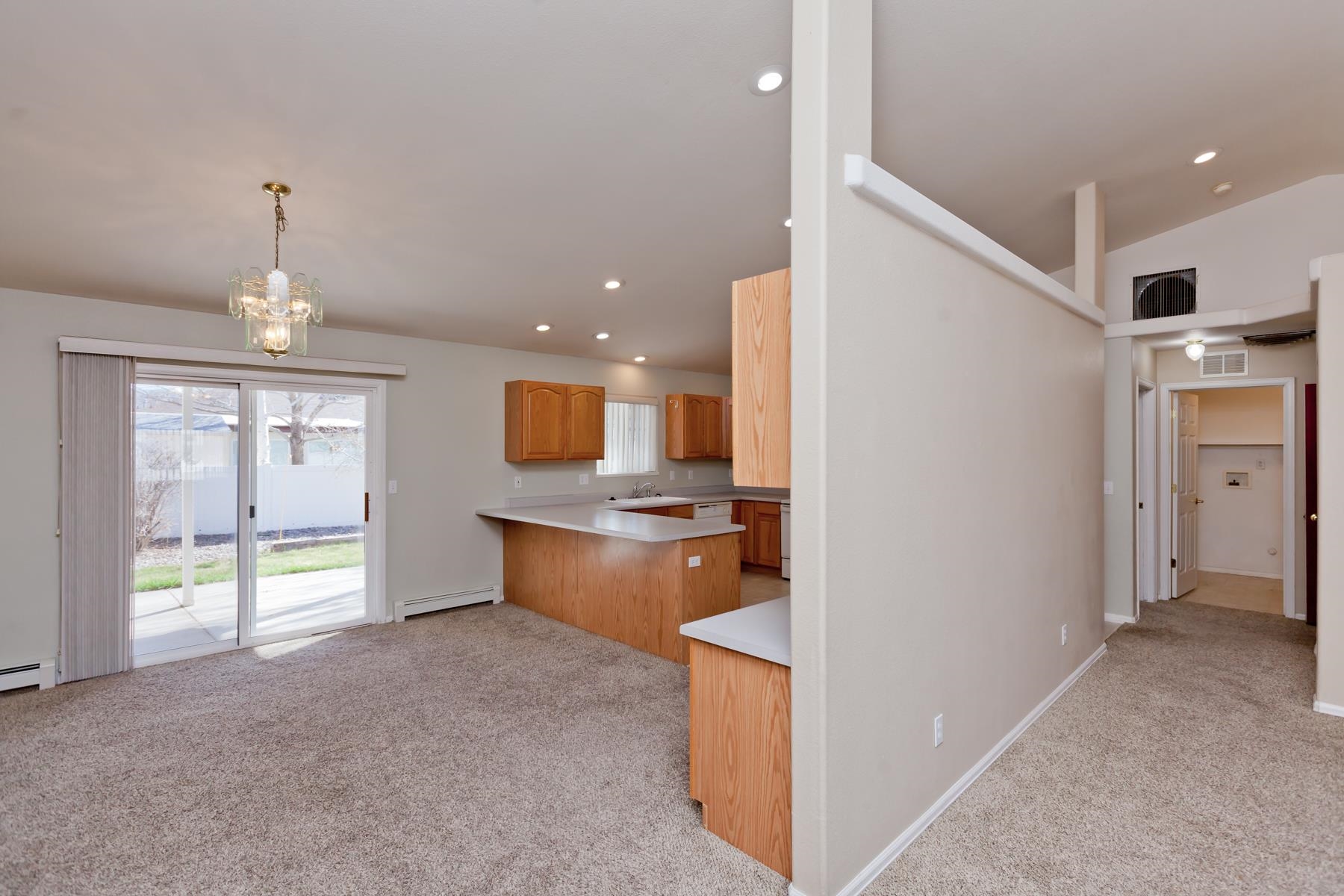 340 Elderberry Drive Fruita, CO 81521 - Photo 6 of 42 a view of kitchen with refrigerator stove and a sink