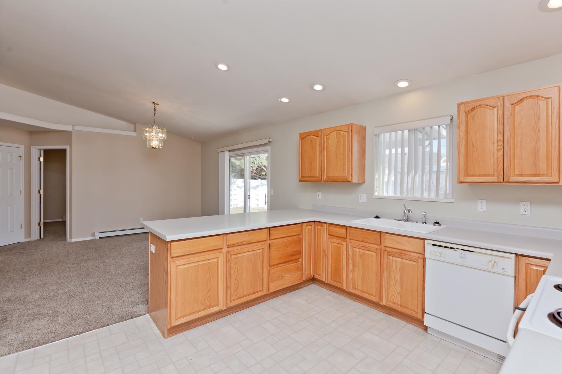 340 Elderberry Drive Fruita, CO 81521 - Photo 9 of 42 a kitchen with a sink and cabinets