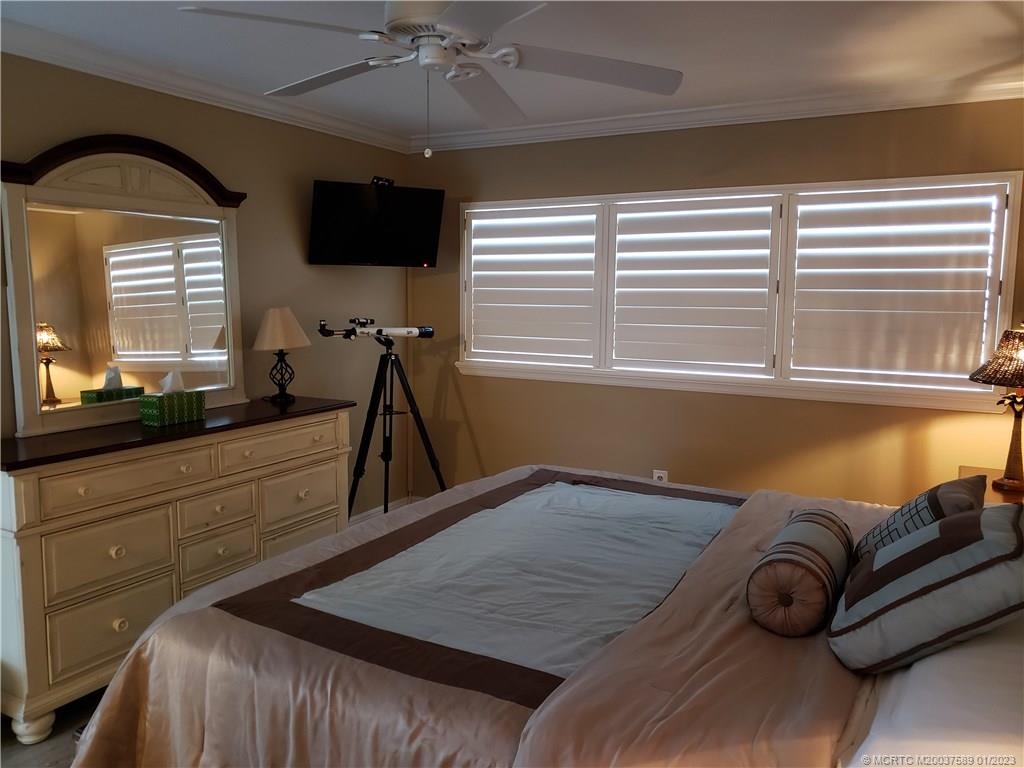 7440 South Ocean Drive, Unit 323A Jensen Beach, FL 34957 - Photo 7 of 12 a view of a livingroom with furniture and window
