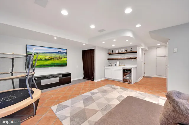 a view of kitchen with furniture and fireplace