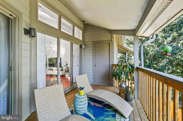 a outdoor living space with furniture and garden view