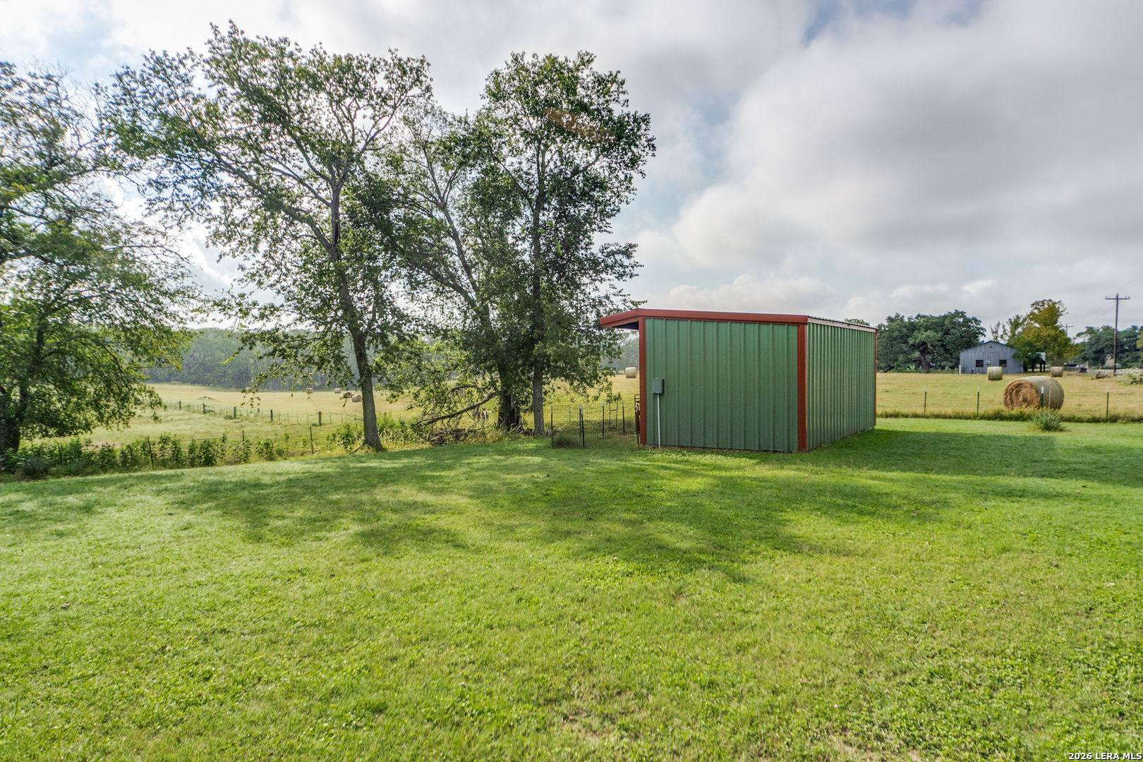 1201 Sisterdale Road Boerne, TX 78006 - Photo 14 of 17 a view of outdoor space with deck and yard