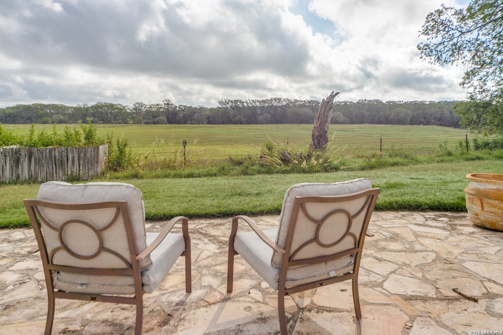 1201 Sisterdale Road Boerne, TX 78006 - Photo 16 of 17 a view of a chairs and table in the garden