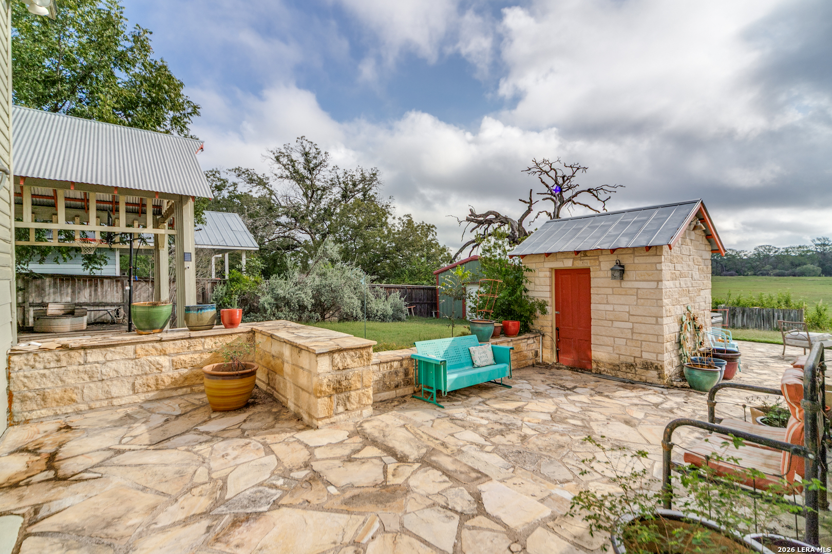 1201 Sisterdale Road Boerne, TX 78006 - Photo 3 of 17 a view of a house with backyard and sitting area