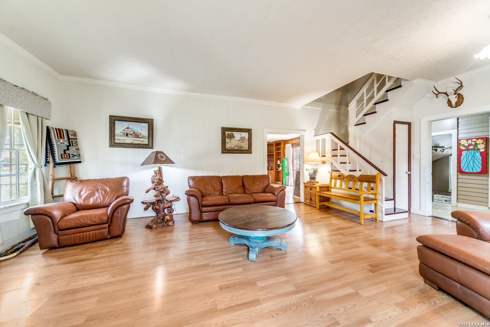 1201 Sisterdale Road Boerne, TX 78006 - Photo 4 of 17 a living room with furniture and a wooden floor