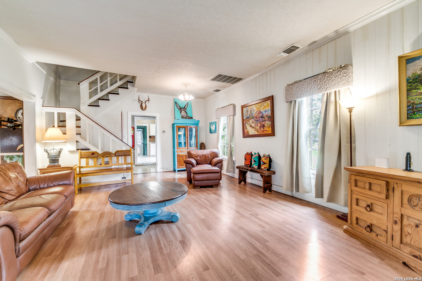 1201 Sisterdale Road Boerne, TX 78006 - Photo 5 of 17 a living room with furniture and wooden floor