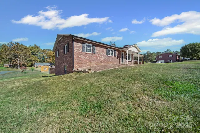 a backyard of a house with lots of green space