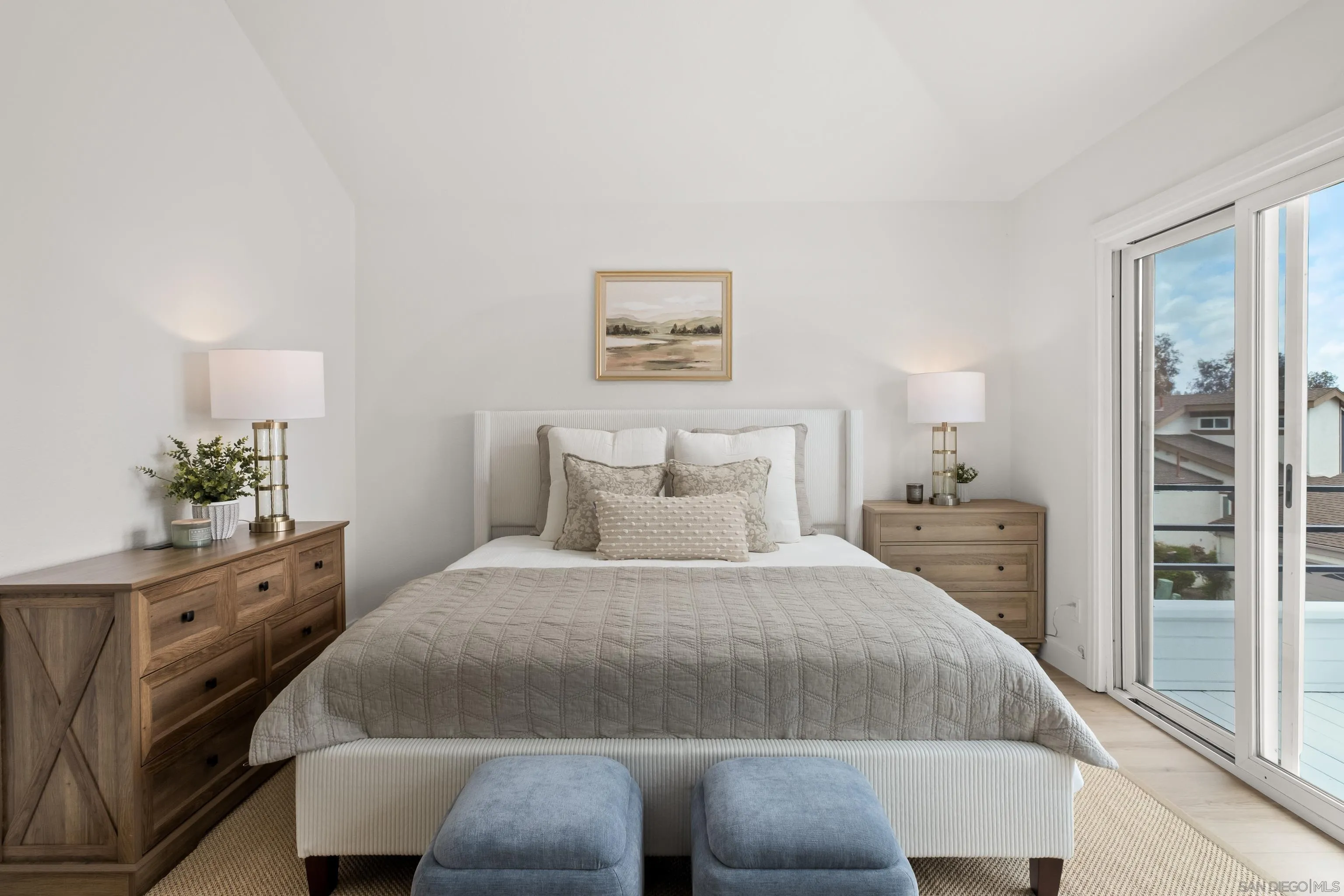 11478 Madera Rosa Way San Diego, CA 92124 - Photo 28 of 54 a bedroom with a bed and a window