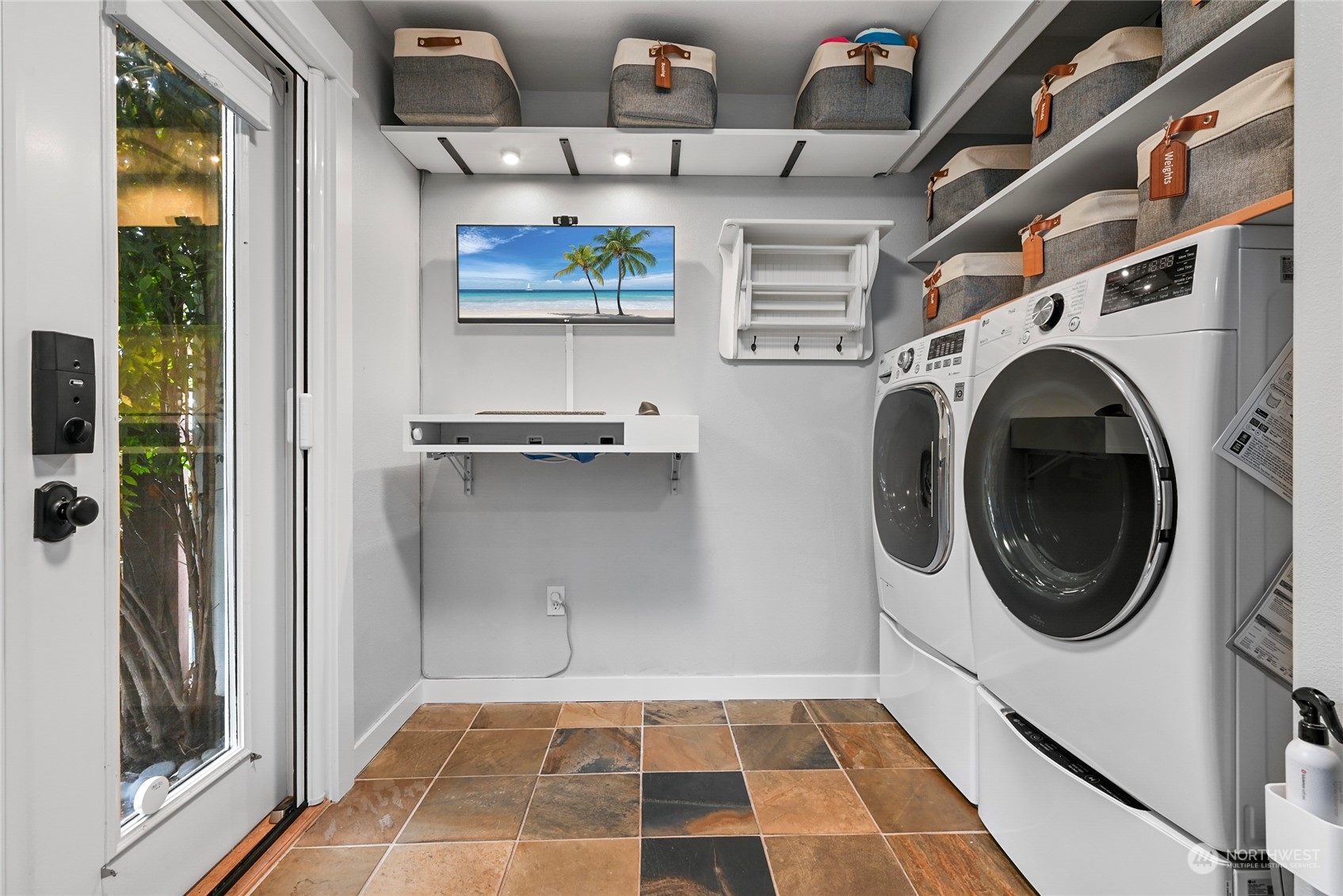 4408 Meridian Avenue North, Unit A Seattle, WA 98103 - Photo 19 of 31 a view of a storage & utility room with washer and dryer