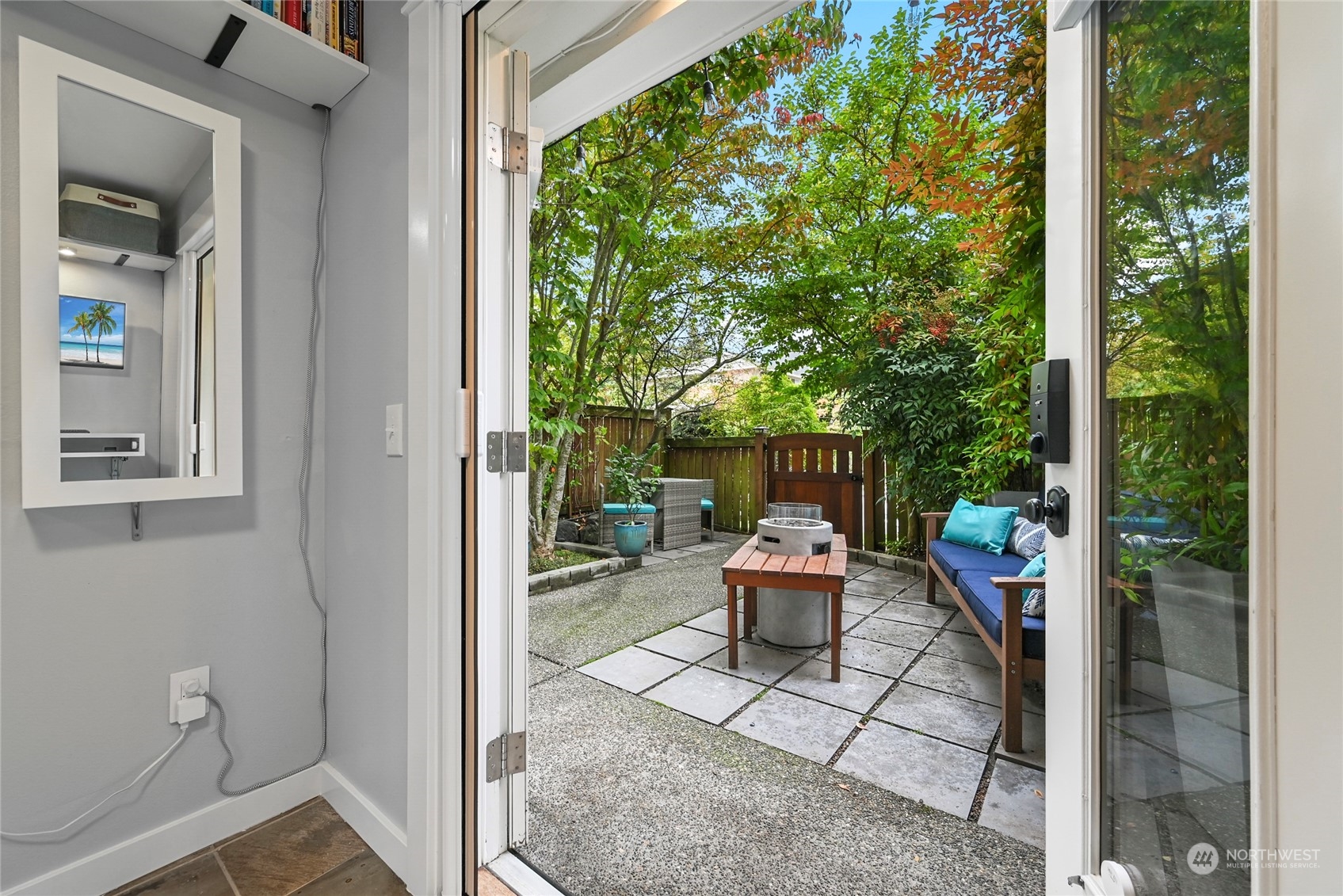 4408 Meridian Avenue North, Unit A Seattle, WA 98103 - Photo 20 of 31 a view of a porch with furniture and garden