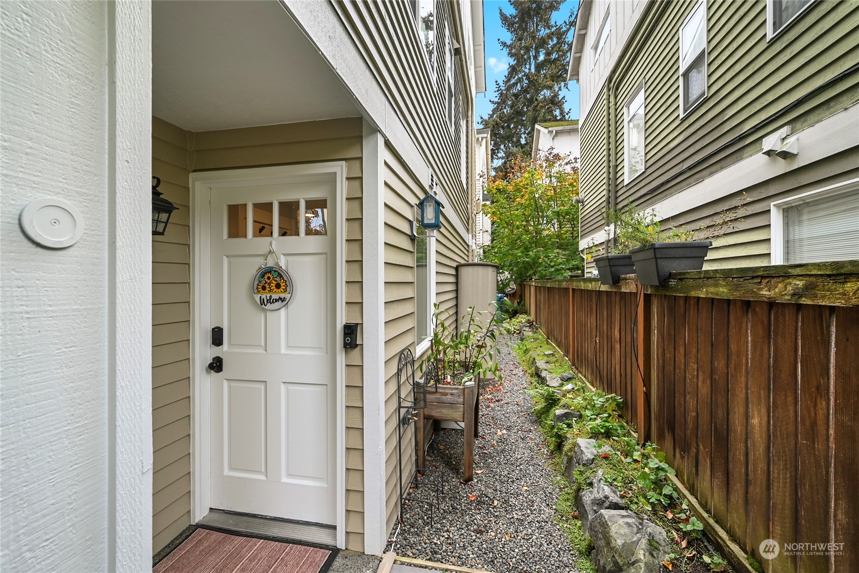 4408 Meridian Avenue North, Unit A Seattle, WA 98103 - Photo 24 of 31 a view of a pathway of a house with wooden floor