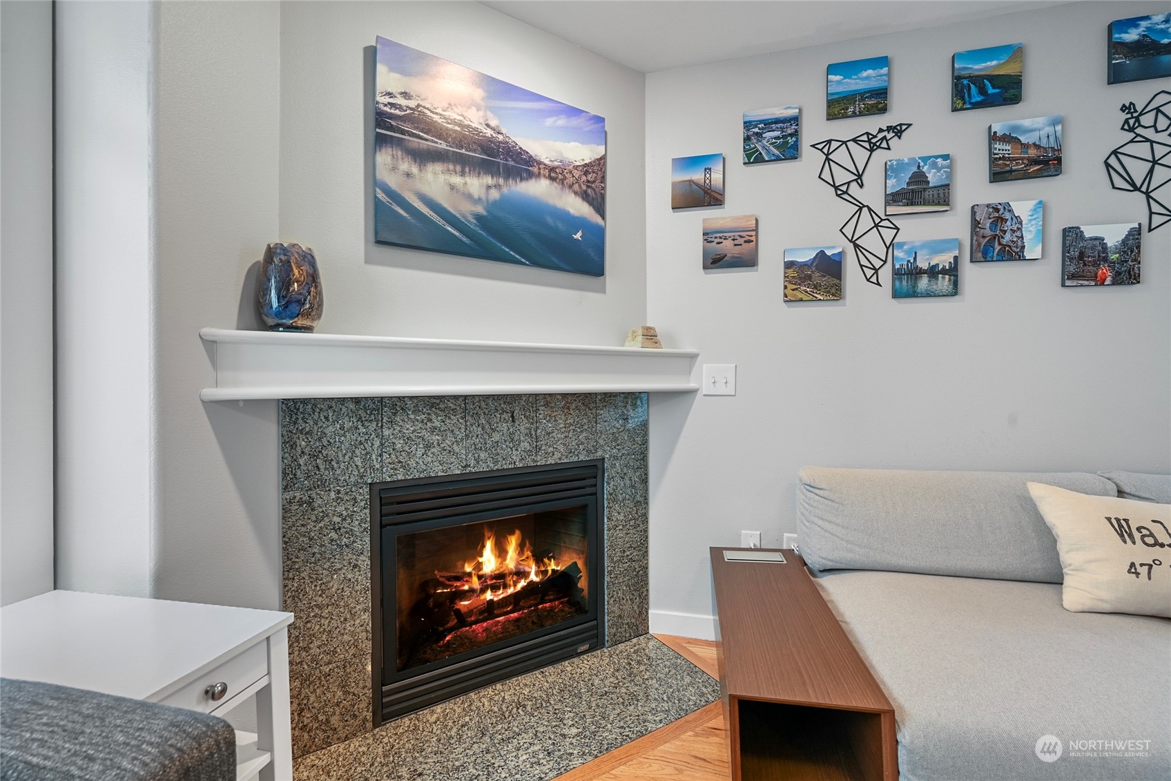 4408 Meridian Avenue North, Unit A Seattle, WA 98103 - Photo 4 of 31 a living room with furniture and a fireplace