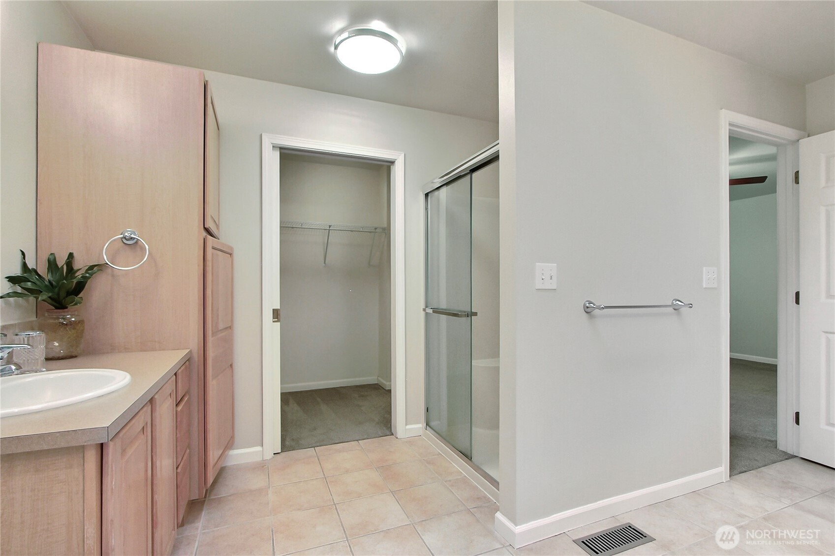 3841 Mari Lane Southeast Olympia, WA 98513 - Photo 11 of 24 a bathroom with a sink and mirror