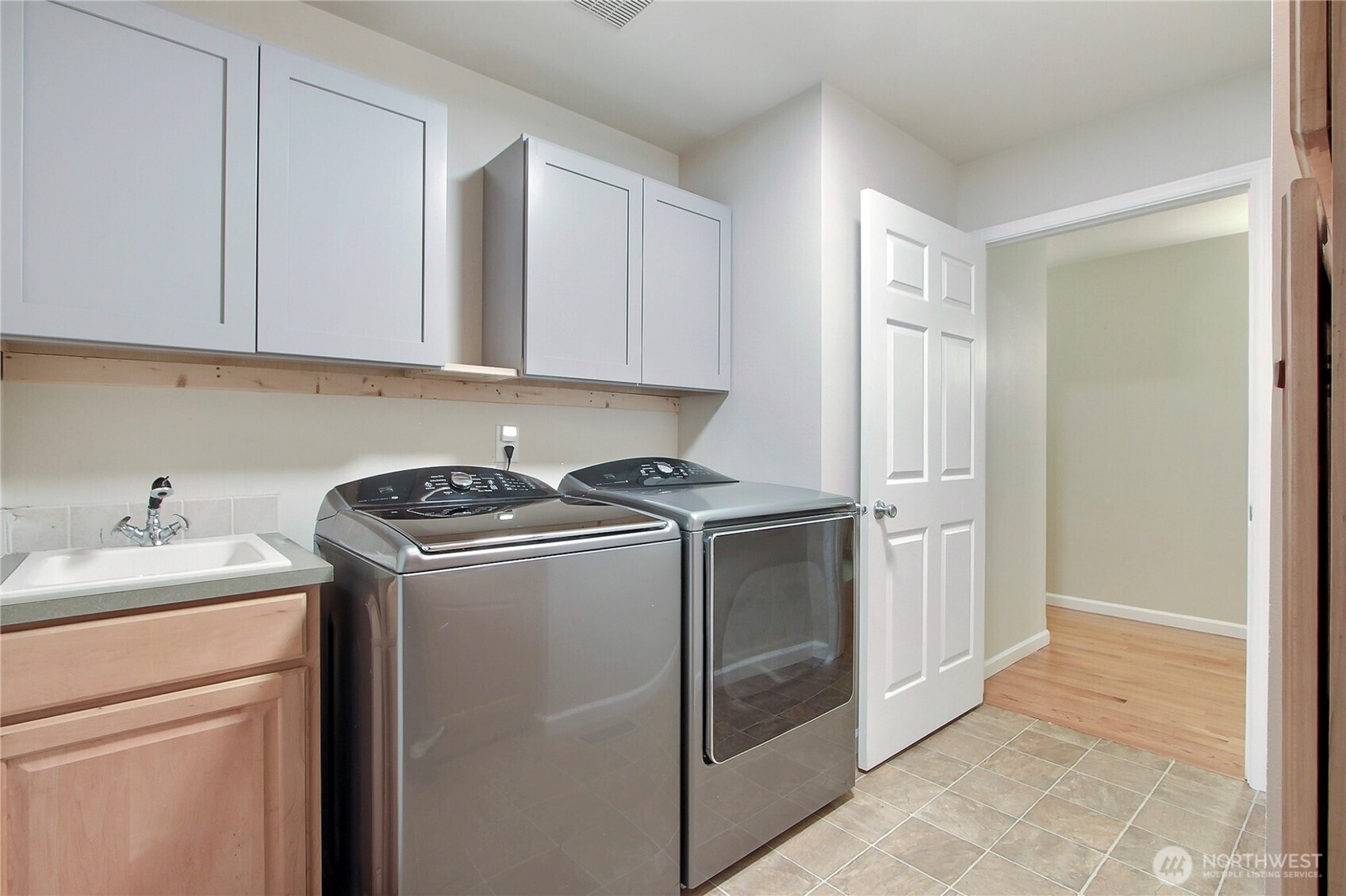 3841 Mari Lane Southeast Olympia, WA 98513 - Photo 12 of 24 a utility room with sink dryer and washer
