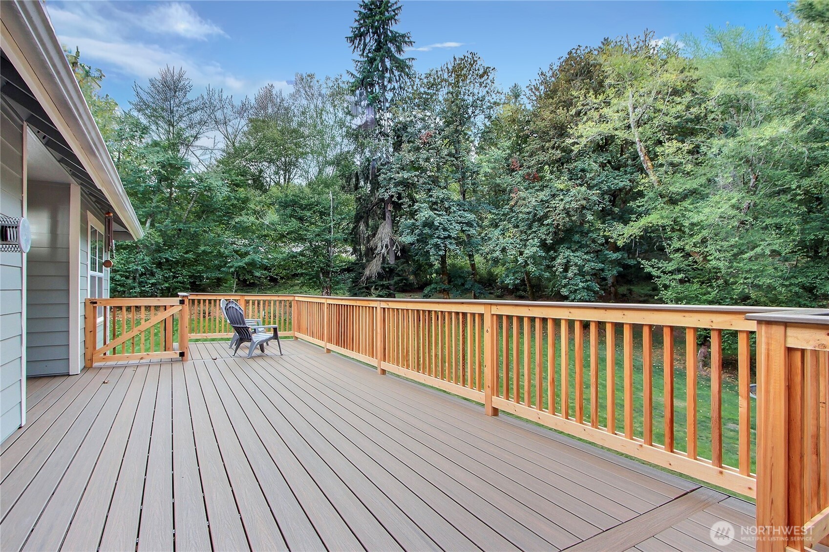 3841 Mari Lane Southeast Olympia, WA 98513 - Photo 17 of 24 a view of balcony with deck and wooden floor