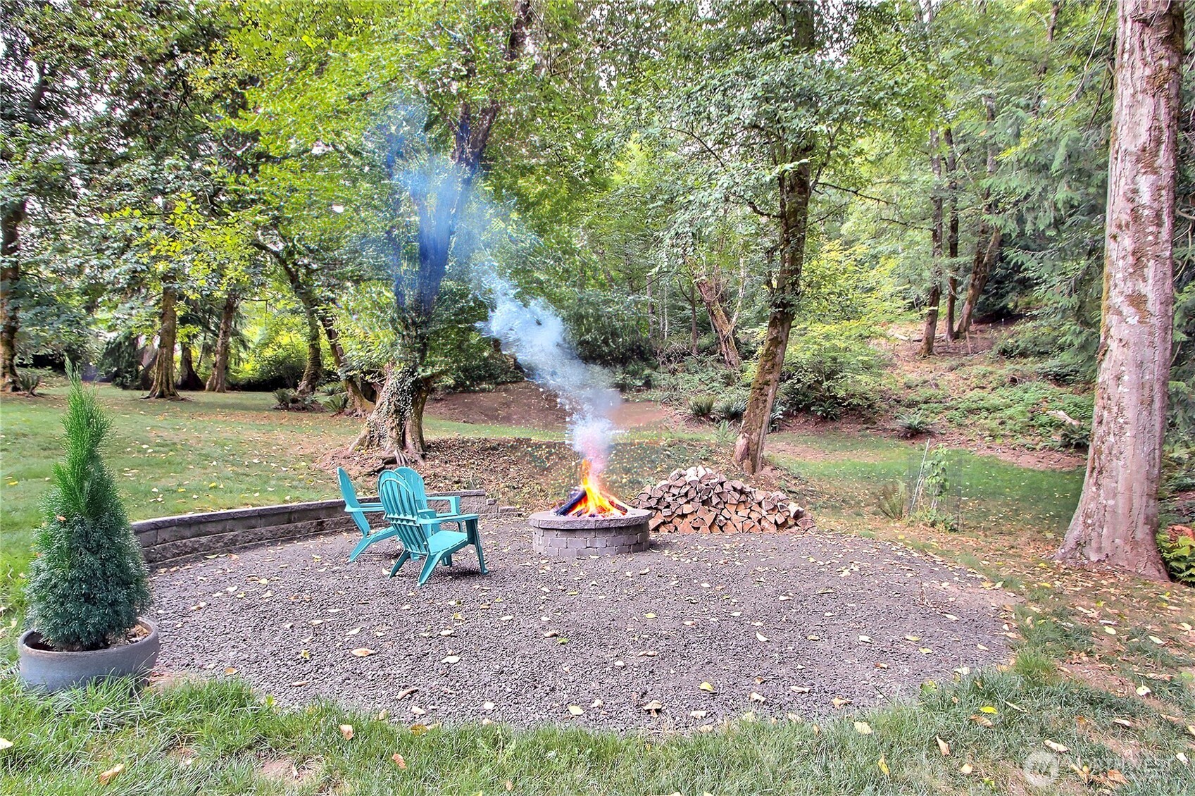 3841 Mari Lane Southeast Olympia, WA 98513 - Photo 20 of 24 a backyard of a house with a yard and outdoor seating