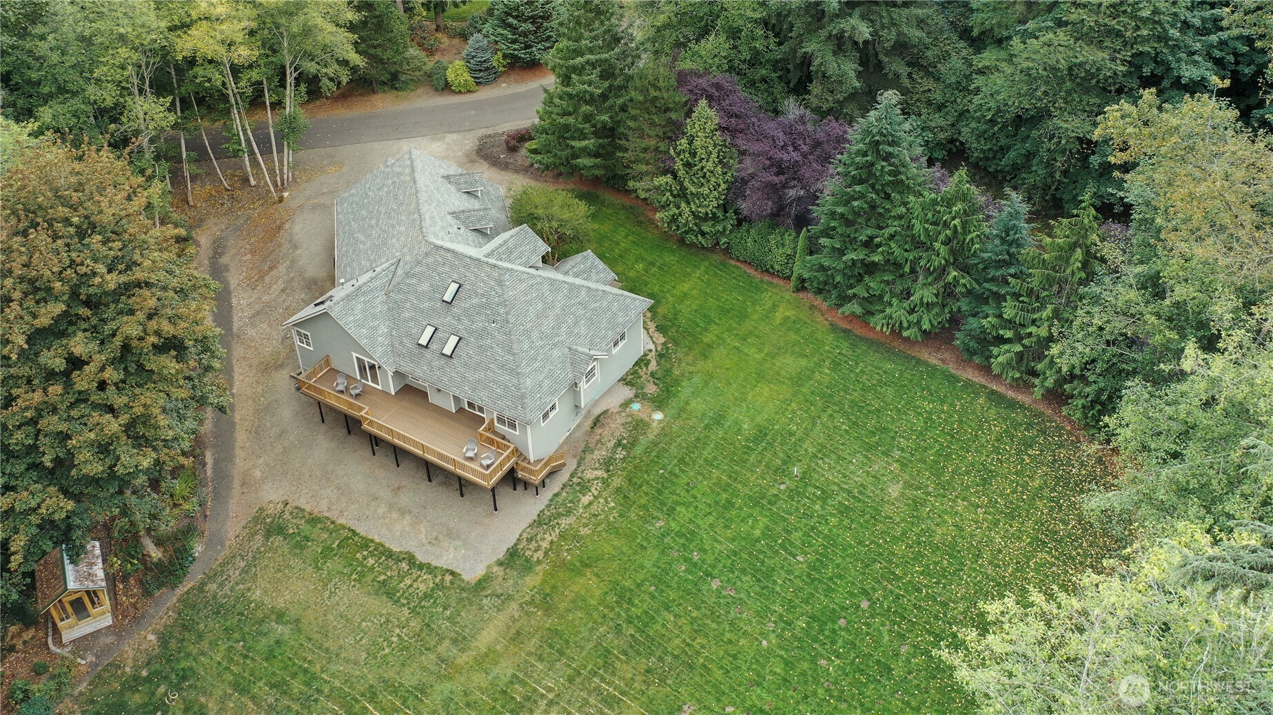 3841 Mari Lane Southeast Olympia, WA 98513 - Photo 24 of 24 an aerial view of a house with a yard