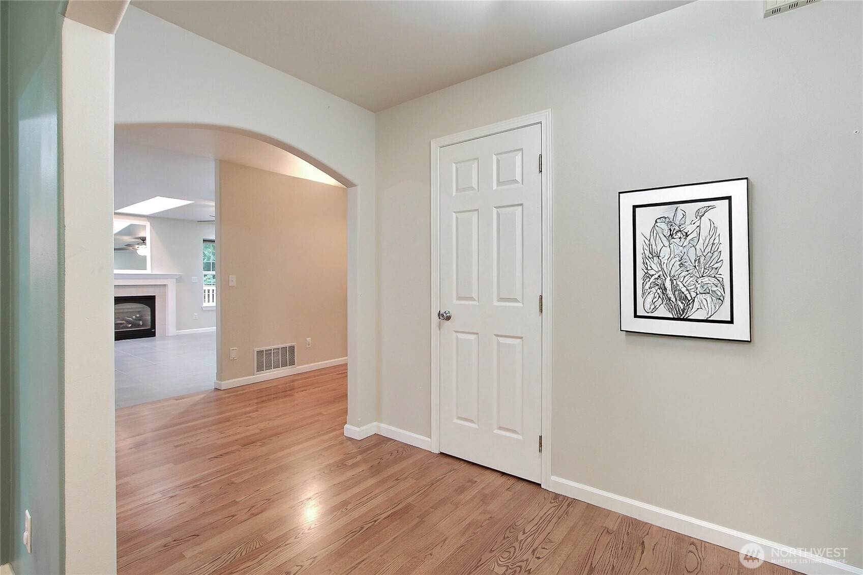 3841 Mari Lane Southeast Olympia, WA 98513 - Photo 7 of 24 a view of an empty room and wooden floor