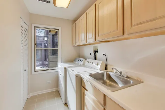 a view of a house with snow on the road