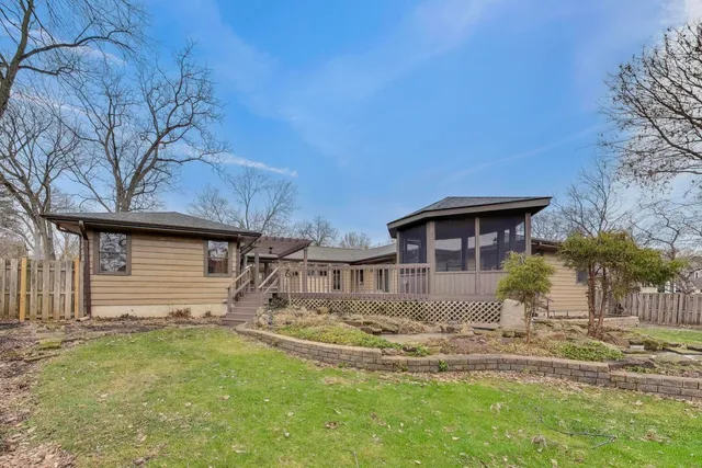 a backyard of a house with lots of green space