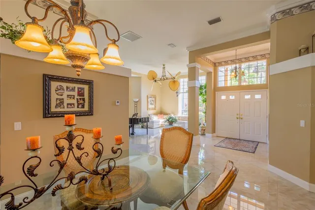 a spacious bathroom with a granite countertop sink a mirror and a shower
