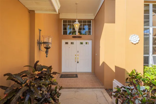 a bathroom with a toilet and a shower curtain