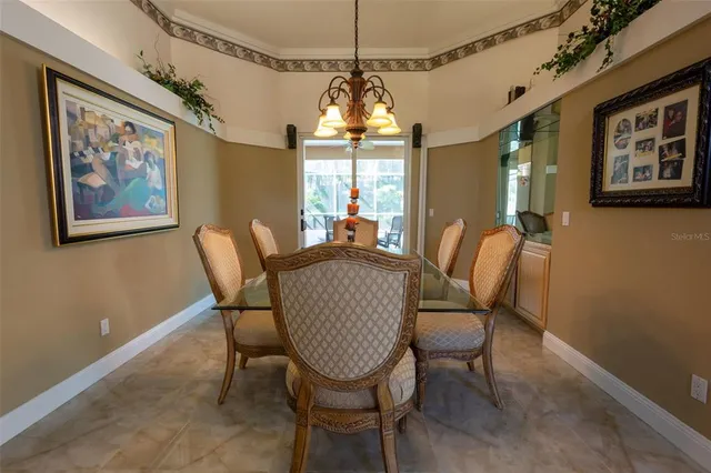 a bathroom with a sink a toilet a mirror and shower